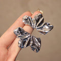 Two Tone Crinkled Leaf Stud Earrings in Gold and Silver view 4