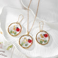 Gold Tone White Flower Ladybug Earrings, Necklace and Coordinated Set view 1