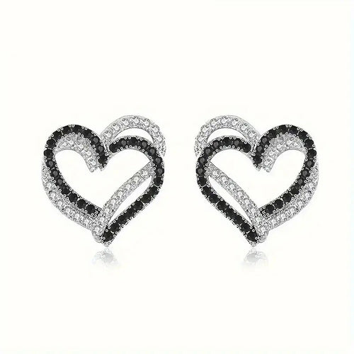 Silver open heart studs with black and clear CZ on white