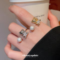 Gold Open Bear Ring With Pearl and Star Crystal Ends view 3