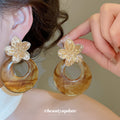 Resin Ring Flower Stud Earrings in Polished Statement Design view 4