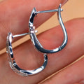 Silver Tone Wave Baguette Clear Stone Huggie Hoop Earrings view 3