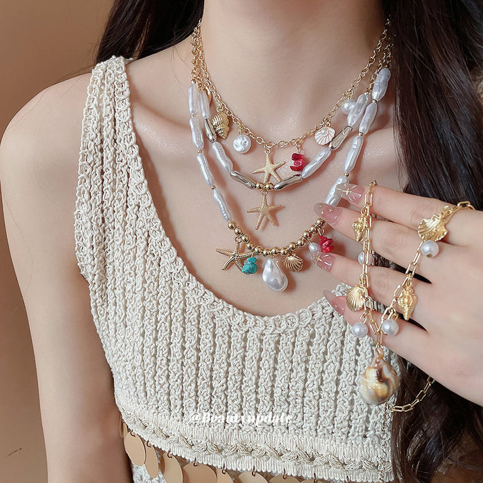 Coastal Shell and Starfish Charm Necklace with Pearl Accents