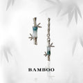 Silver-Tone Asymmetric Bamboo Drop Earrings Teal Accent view 1