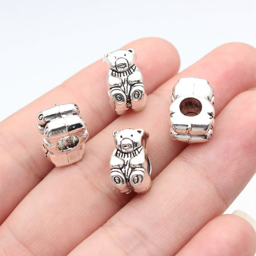 Teddy Bear Large Hole Bead displayed in a hand for shape and finish detail