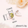 Silver Yellow Enamel Daisy Black Center Huggie Hoop Earrings view 4
