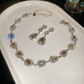 Teardrop Crystal Necklace And Earring Set In Clear Or Green view 6