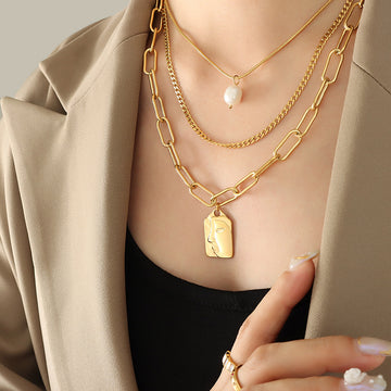 Layered Face Plaque Pearl Necklace Gold Steel Multi Chain