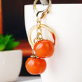 Twin Persimmon Keychains in Red, Orange and Yellow Green Colors view 4