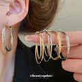 Double Layer Textured Hoop Earrings in Gold with Polished Details view 3