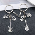 Silver Tone Guitar Drum and Saxophone Music Keychains view 2