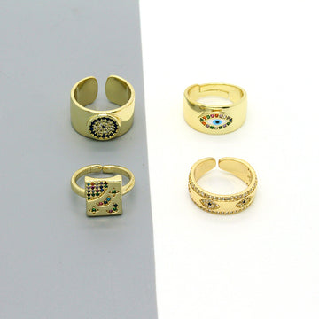 Gold Tone Crystal Eye and Celestial Open Rings in Four Styles