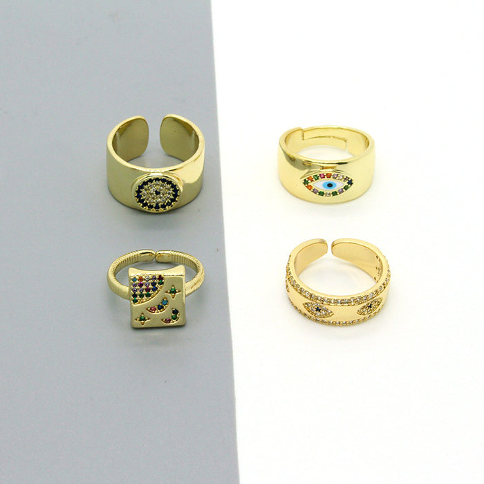 Gold Tone Crystal Eye and Celestial Adjustable Rings in Four Designs