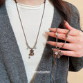 Brown Teddy Bear Pendant Necklace With Polished Metal Tone Details view 1