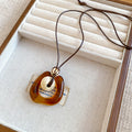 Brown Resin Geometric Pendant Cord Necklaces in Six Designs view 9