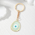 Irregular Oval Resin Evil Eye Keychains Gold Ring 6 Colors view 4