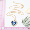 Gold Tone Crystal Halo Blue Heart Evil Eye Pendant Necklace view 3