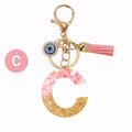 Resin Initial Letter Keychain with Evil Eye and Pink Tassel view 7