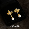 Gold Tone Openwork Iris And White Pearl Drop Stud Earrings view 4