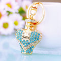 Heart Perfume Bottle Keychains in Pink Blue Champagne and Assorted Colors view 3