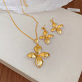 Gold Four-Petal Flower Necklace and Matching Earrings view 6