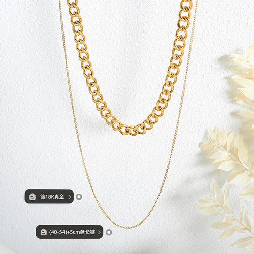Gold curb and snake chains flat lay with length and plating labels