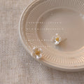 Pearlescent White Four-Petal Flower Gold Center Stud Earrings view 4