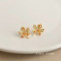 Gold Maple Leaf Stud Earrings With Amber And Clear CZ view 4