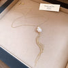 Gold Tassel Pearl