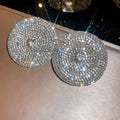 Round Crystal Pave Statement Studs in Three Finishes view 8