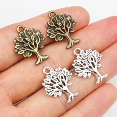 Openwork Tree Charms arranged in the pictured color and finish options