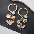 Yellow Honey Jar Bee Daisy and Faux Pearl Charm Keychain view 2