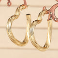 Open Heart Hoop Earrings in Gold-Tone Metal Jewelry view 3
