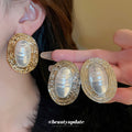 Ribbed Oval Frame Pearl Statement Stud Earrings in Gold and Silver view 4