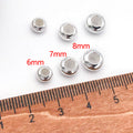 Donut Shaped Metal Stopper Beads With Silicone Cores in Three Finishes view 6