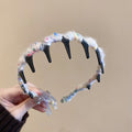 Seven Wrapped And Plain Wavy Tooth Headbands In Black White Brown And Blue view 7