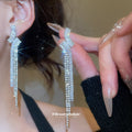 Crystal Wave and Chain Tassel Drop Earrings in Two Tones view 3