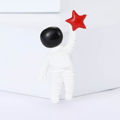 White Astronaut and Red Star Brooch isolated front view