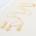 Gold Tone Faux Pearl Flower Pendant Necklace and Huggie Earrings view 4