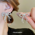 Silver Tone Crystal Bow Stud Earrings With Chain Tassels view 1