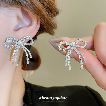 Silver Tone Crystal Bow Stud Earrings With Chain Tassels