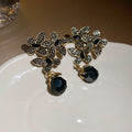 Antique Gold Tone Floral Earrings with Black Bead Drops view 6