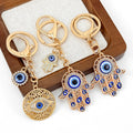 Hamsa Hand and Evil Eye Charm Keychain in Gold and Silver Tone view 2