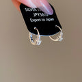 Crystal Pave Huggie Earrings in Three Metal Finishes view 7