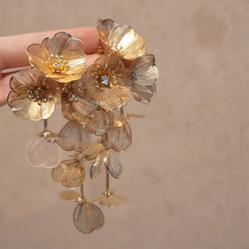 Assorted Vintage Style Colorful Statement Drop earrings shown in a close handheld view.