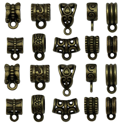 Gold-tone connector clasp jewelry findings arranged on a light background