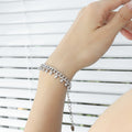 Gold Tone Curb Bracelet With Ball Bead Dangles Lobster Clasp view 6