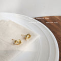 Gold Metal Knot Stud Earrings Pair Smooth Twist Design view 6