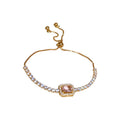 Gold Tone Crystal Slider Bracelet With Pale Pink Rectangular Center Stone view 5