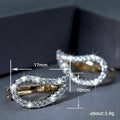 Two-Tone Twisted Teardrop Huggie Earrings with Clear Stone Details view 5